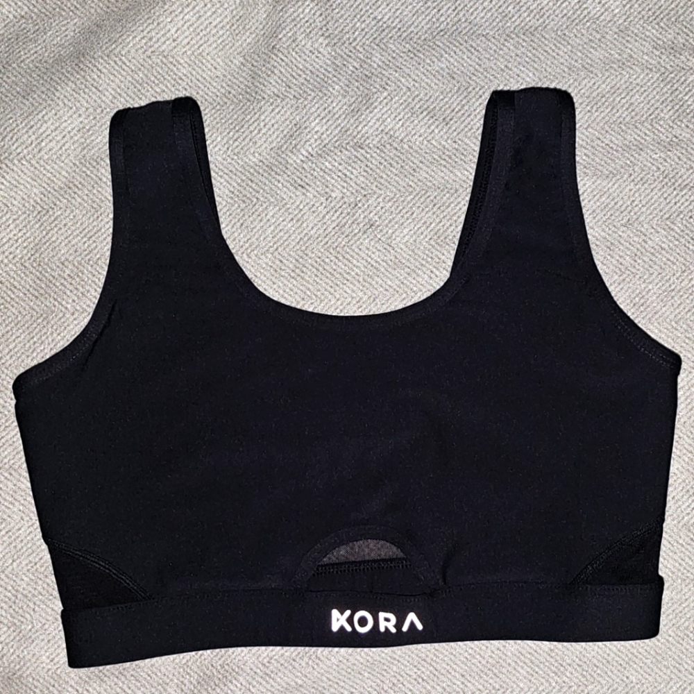 Kora black sports bra. Sleek and comfortable design. Size M